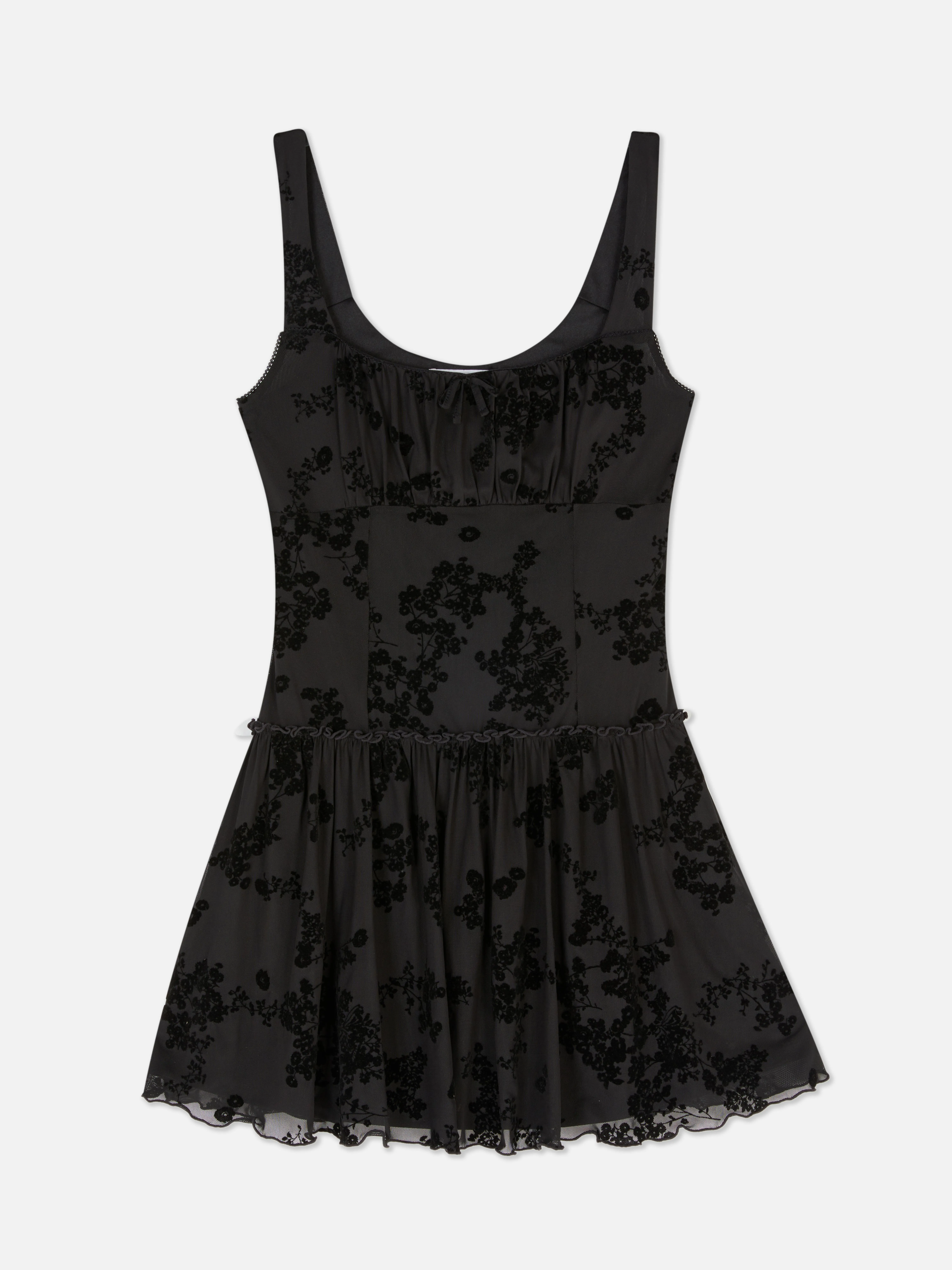 Vestido corto de malla con diseño devoré de Rita Ora